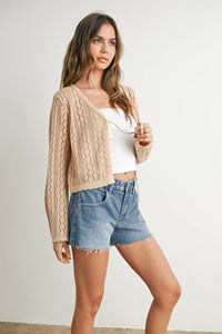 Beige knitted tie-front cardigan with long sleeves and square neckline