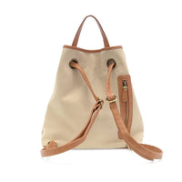 Beige memphis canvas backpack with tan leather straps and handles featuring a front zippered pocket