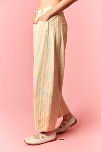 Beige and cream checkered wide-leg trousers with relaxed fit in washed gingham printed twill barrel style