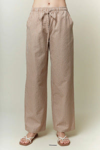 Beige and cream yarn dye stripe elastic pants with wide-leg cut and drawstring waistband for comfortable wear