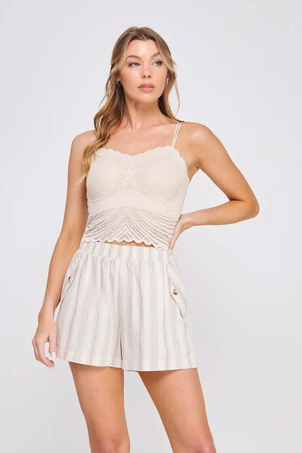 Beige crochet crop top featuring fine lace pattern scallop bralette with delicate lace detailing and scalloped edges