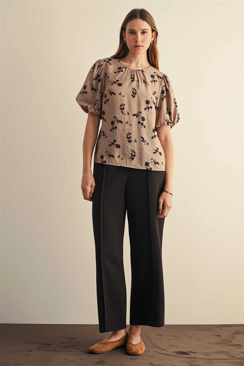Beige floral print balloon sleeve blouse with puffed short sleeves and gathered neckline for elegant wear