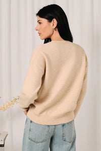 Beige mallard duck graphic knit sweater with soft cozy texture and ribbed cuffs in a warm knit material