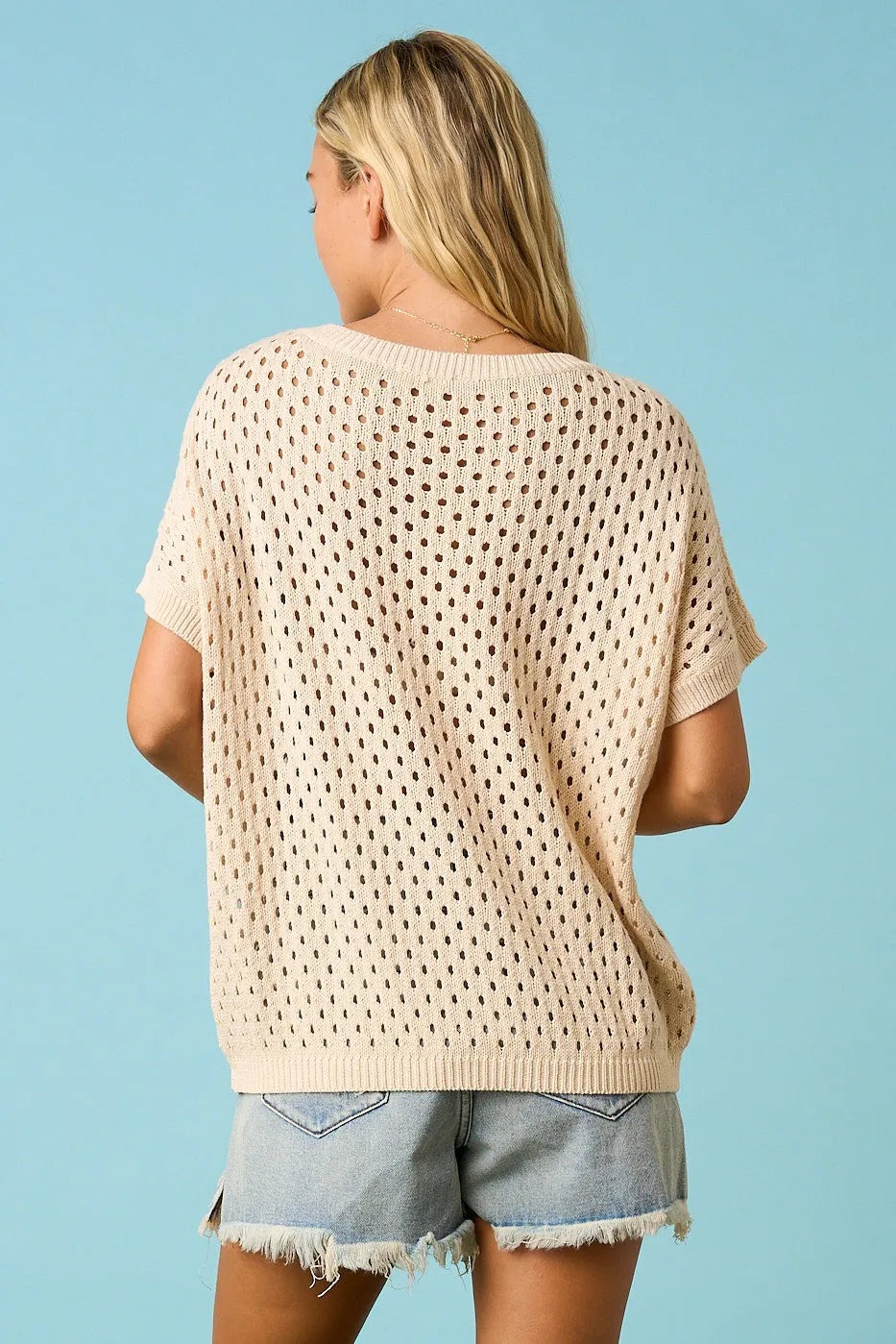Beige knitted short-sleeved usa star patch open knit sweater top with perforated pattern and ribbed hem