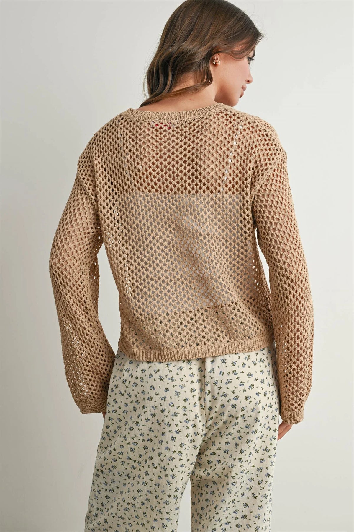 Elegant long sleeve see-through beige knitted sweater with mesh pattern and ribbed cuffs