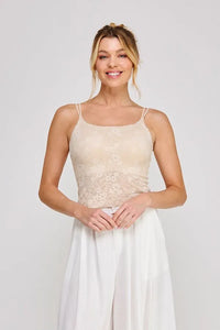 Beige padded floral laced bralette with delicate floral embroidery and thin spaghetti straps in lace material