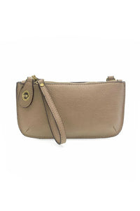 Beige leather mini crossbody wristlet clutch with gold-tone zipper circular clasp and card slots for women’s boho chic clothing
