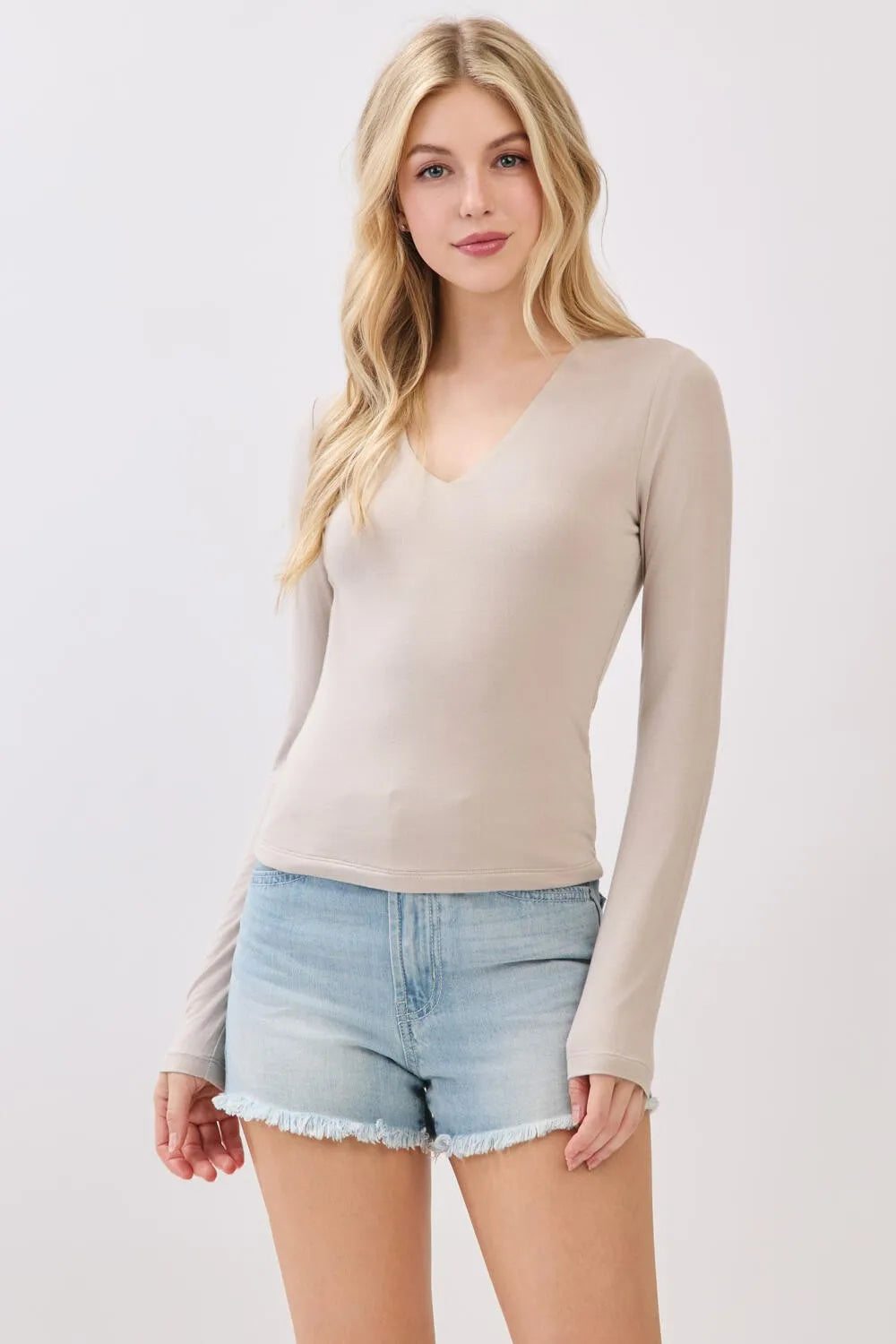 Beige double layer v neck long sleeve basic top made of smooth stretchy fabric for comfortable wear