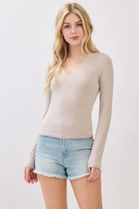 Beige double layer v neck long sleeve basic top made of smooth stretchy fabric for comfortable wear
