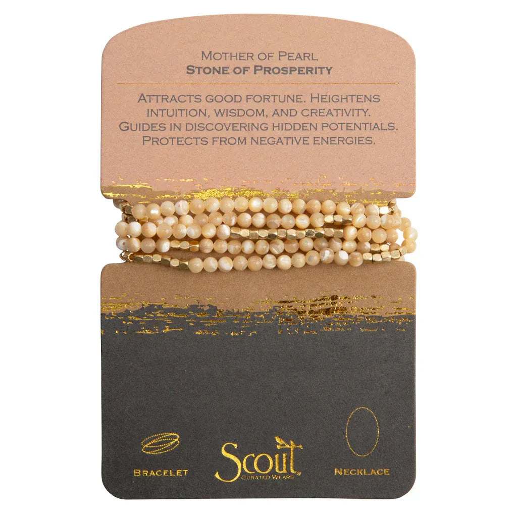 Beige mother-of-pearl natural gemstone stone wrap bracelet with gold accents on scout curated wears display card