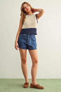 Beige and navy blue color blocked sleeveless knitted top with textured pattern and ribbed hem