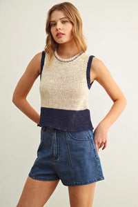 Beige and navy color blocked sleeveless knitted top with textured ribbed hem for stylish casual wear