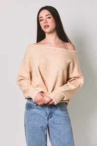 Beige off the shoulder knit sweater with relaxed oversized fit ribbed cuffs and contrast trim boat neck design