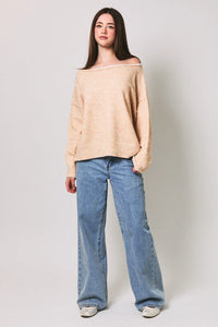 Beige off-the-shoulder knit sweater with relaxed fit ribbed cuffs and contrast trim boat neck design