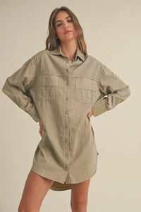 Beige washed buttondown shirt dress with oversized fit and two front pockets in women’s boho chic clothing style
