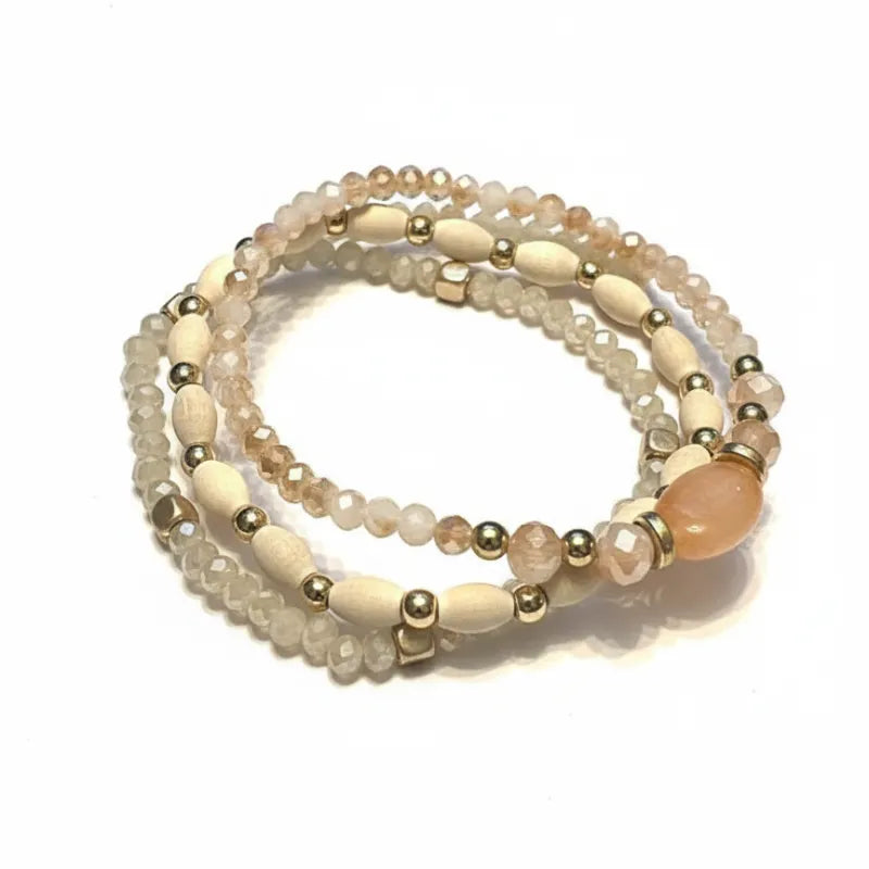 Beige and peach-toned beaded wrap bracelet with gold-tone accents from boho gemstone and wood beaded bracelets for womens boho clothes