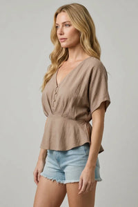 Beige draped sleeves button front blouse with peplum design and short flutter sleeves for a stylish look