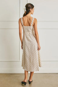 Beige polka dot linen midi dress with thin straps smocked bodice and adjustable buckle belt for a stylish fit