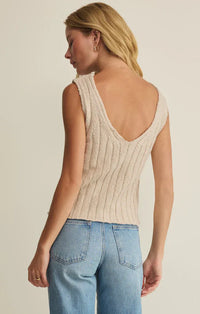 Beige ribbed knit acadia sweater tank top showing deep v-back with slightly frayed edges in sleeveless design