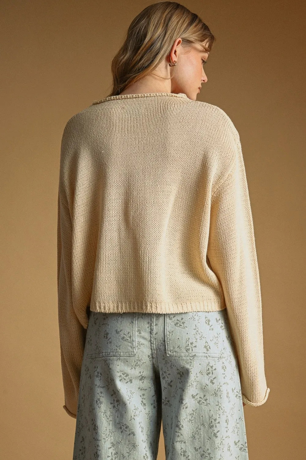 Beige ribbed knit easy knitted cardigan with relaxed fit and dropped shoulders button front style
