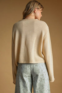 Beige ribbed knit easy knitted cardigan with relaxed fit and dropped shoulders button front style