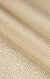 Beige ribbed knit fabric detailing on twill wide leg utility pants with a soft textured surface