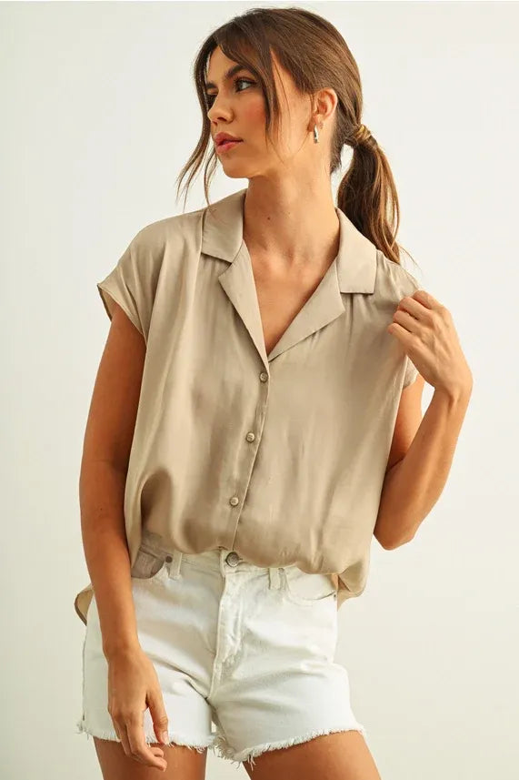 Beige lightweight button cap sleeve shirt with collar and subtle sheen perfect for warm weather wear