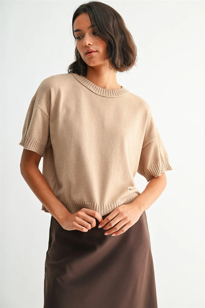 Beige crew neck crop short-sleeved knit top with ribbed cuffs and neckline in lightweight fabric