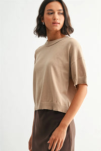 Beige crew neck crop short-sleeved knit sweater with ribbed cuffs and hem featuring crop row edge detail