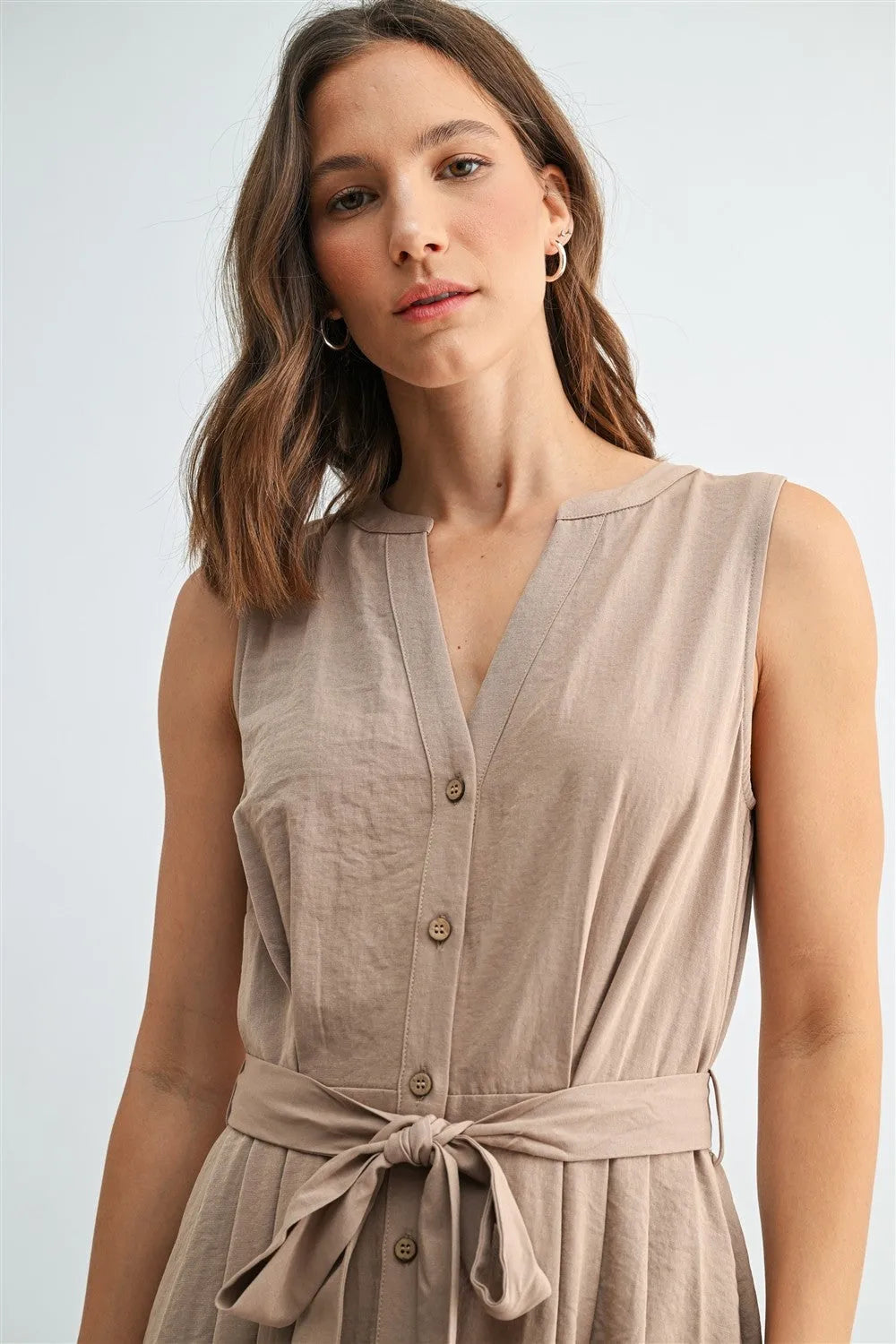 Beige sleeveless linen tie midi dress with v neck button front and self-tie waistband for elegant wear