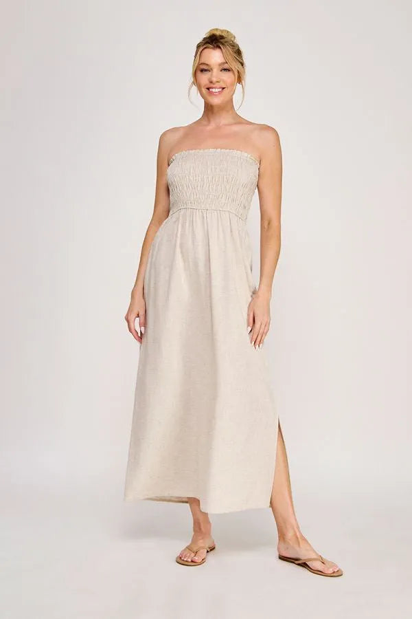 Beige strapless maxi dress with a smocked bodice, side slit, and pockets maxi dress perfect for summer wear