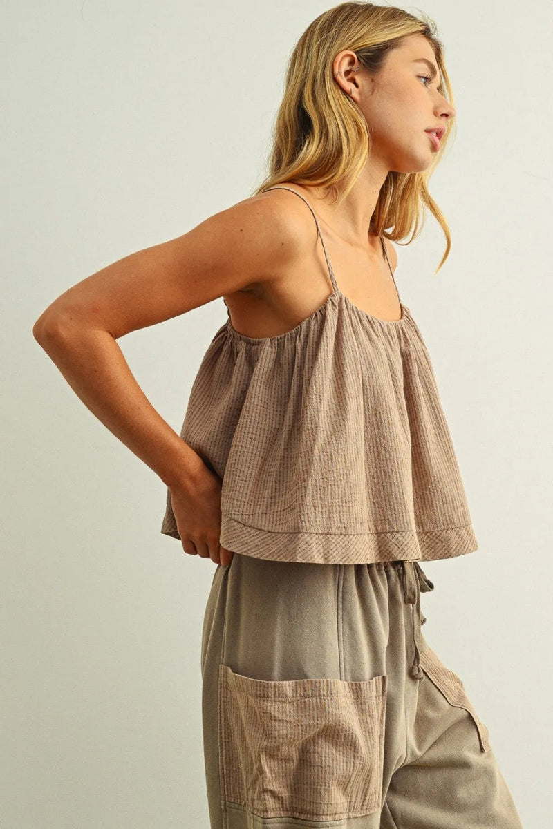 Beige textured cotton crop top with thin striped pattern spaghetti straps and ruffled hem for stylish wear
