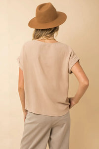 Beige textured short roll up sleeve top with relaxed fit for women’s boho chic clothing available at shop daisy