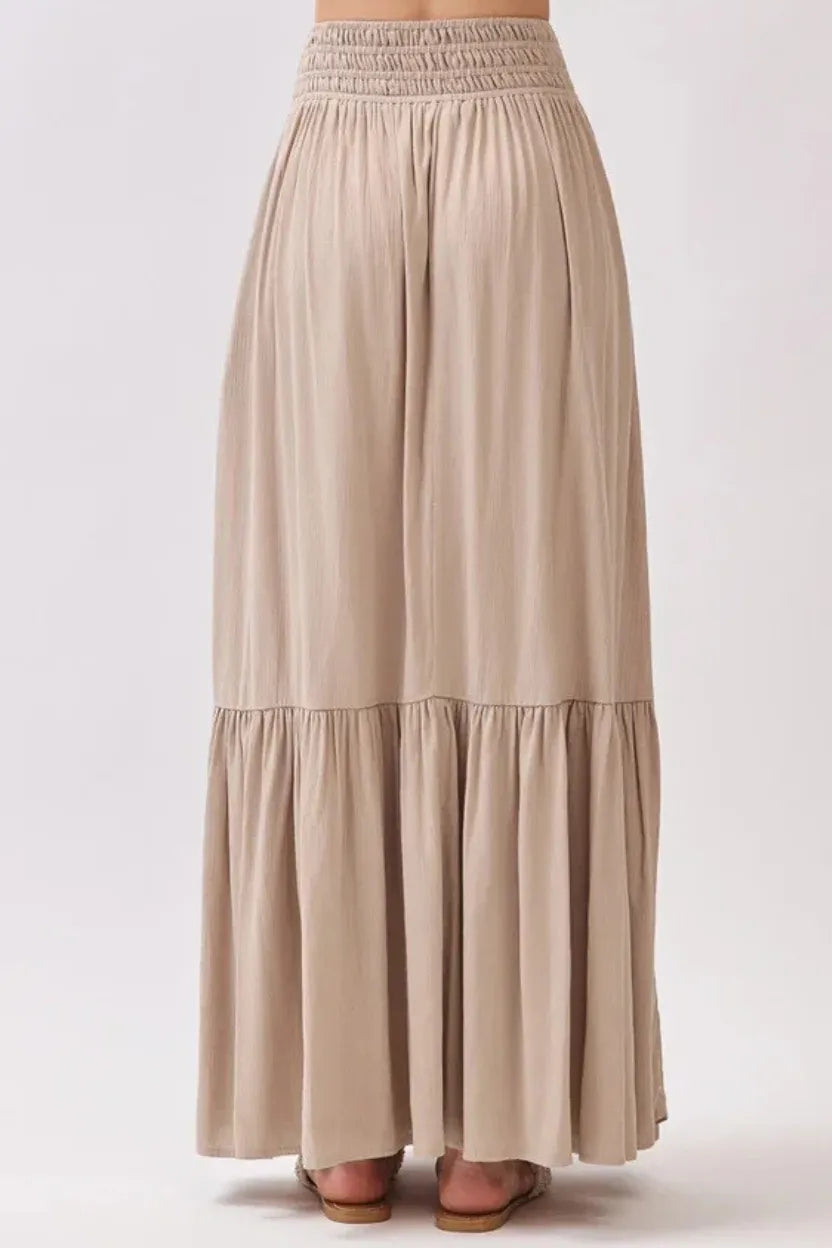 Ruffled smocked waist tiered maxi skirt in beige with elastic waistband