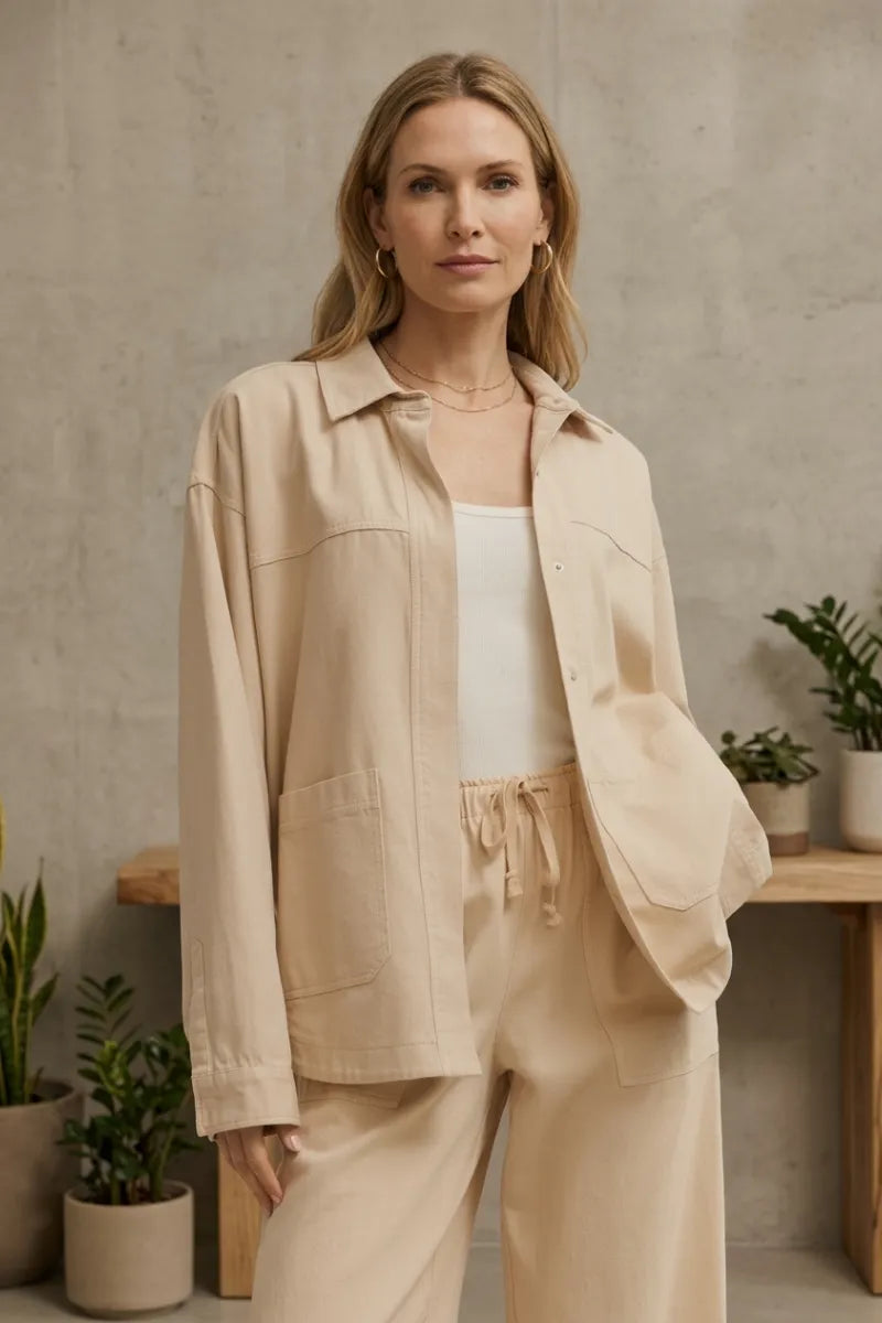 Beige bay breeze twill jacket with utility-style button-up front pockets and a relaxed fit design