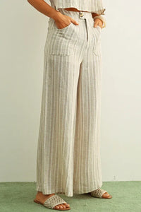 Beige and white vertically striped jacquard linen pockets pants in a lightweight fabric for women’s boho chic clothing
