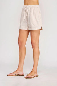 Beige and white vertically striped linen shorts with tie elastic waist and elastic waist pockets for casual wear