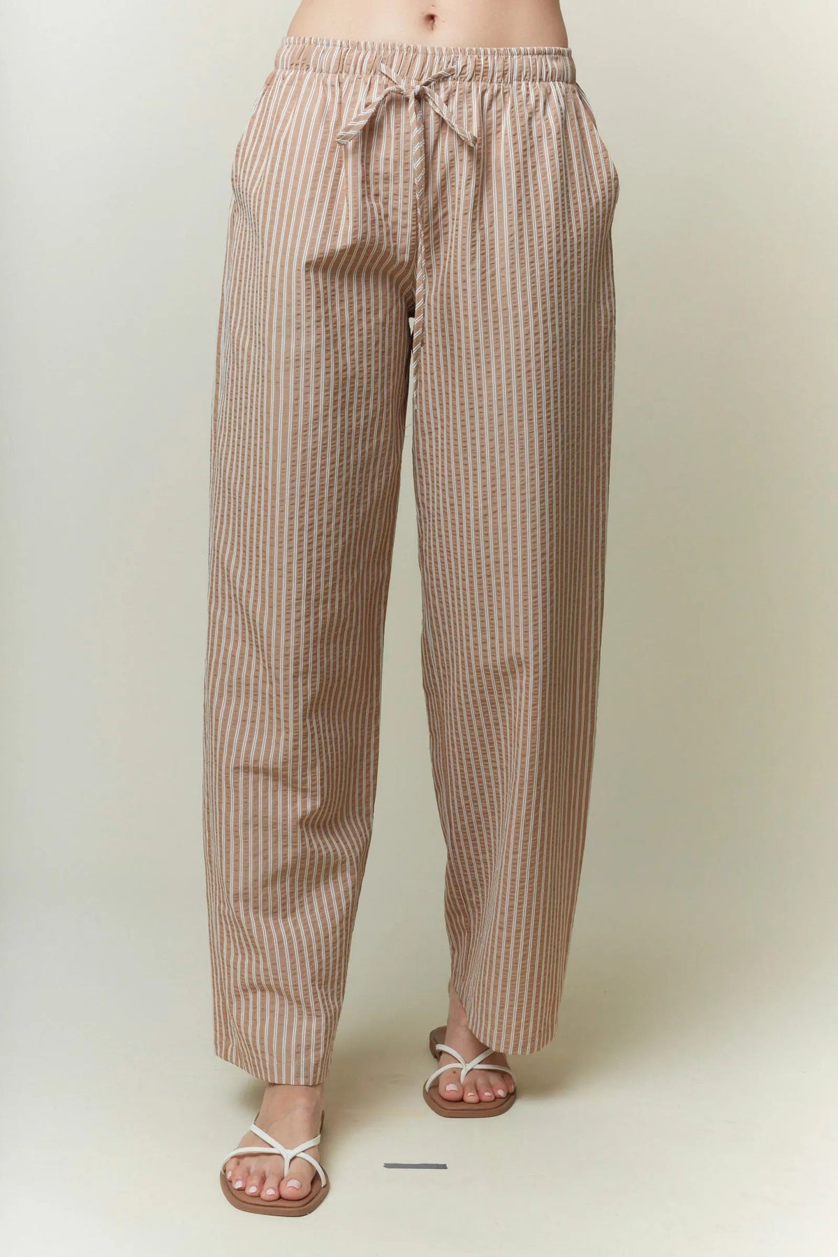 Beige and white yarn dye stripe elastic wide-leg pants with drawstring tie and elastic waistband