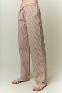Beige and white yarn dye stripe elastic pants with wide-leg fit and drawstring waistband for comfortable wear