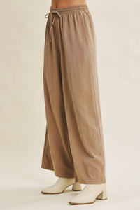 Beige every step washed look wide leg pants with elastic waistband and drawstring in soft flowing fabric