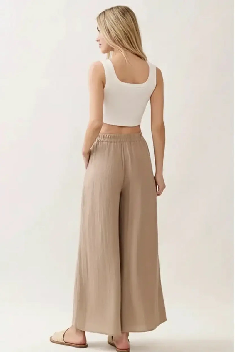 Woven wide leg pull on pants in beige with elastic waistband
