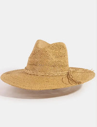 Beige woven straw fedora featuring a braided rope band with tassel detail for stylish sun protection