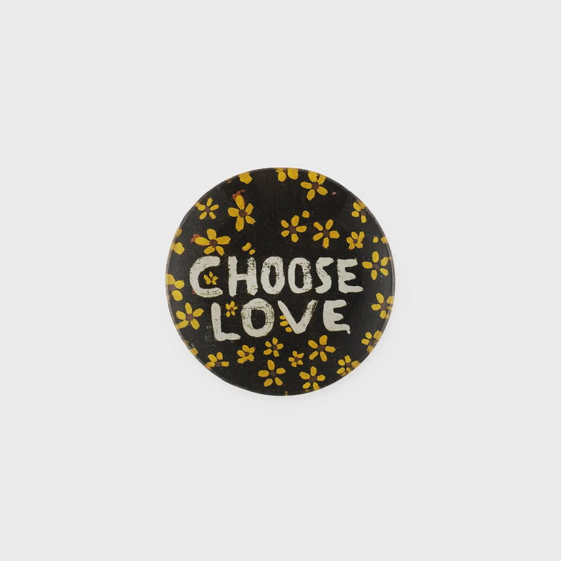 Black circular choose love mini round decoupage plate with white stenciled lettering and yellow flower pattern