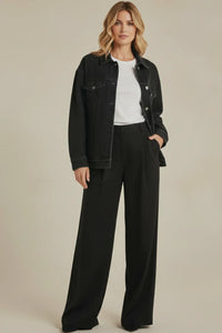 Miles oversized denim jacket in black with button closure and flap pockets