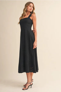 Black embroidered lace sleeveless empire midi dress with square neckline and thin straps for elegant occasions
