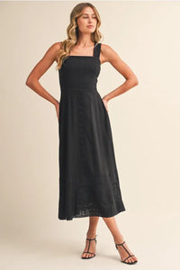 Black embroidered lace sleeveless empire midi dress with square neckline and delicate eyelet detailing along hem