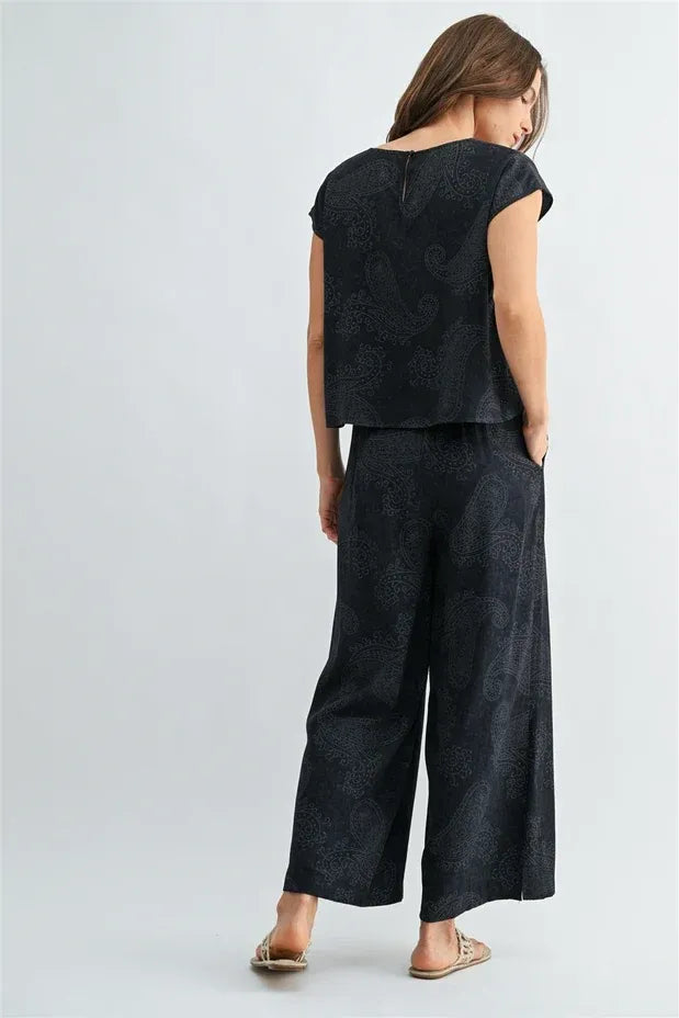 Black embroidered paisley printed wide shoulder top and matching wide leg pants set in elegant fabric