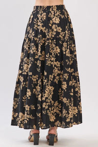 Black floral drawstring tiered midi skirt with gold blossoms and elastic waistband for elegant wear