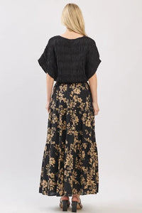 Black floral drawstring tiered midi skirt with gold botanical print and tiered hem perfect for casual wear