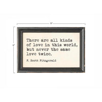 Black-framed rectangular wood framed wall decor featuring a typewriter-style quote for elegant framed wall decor